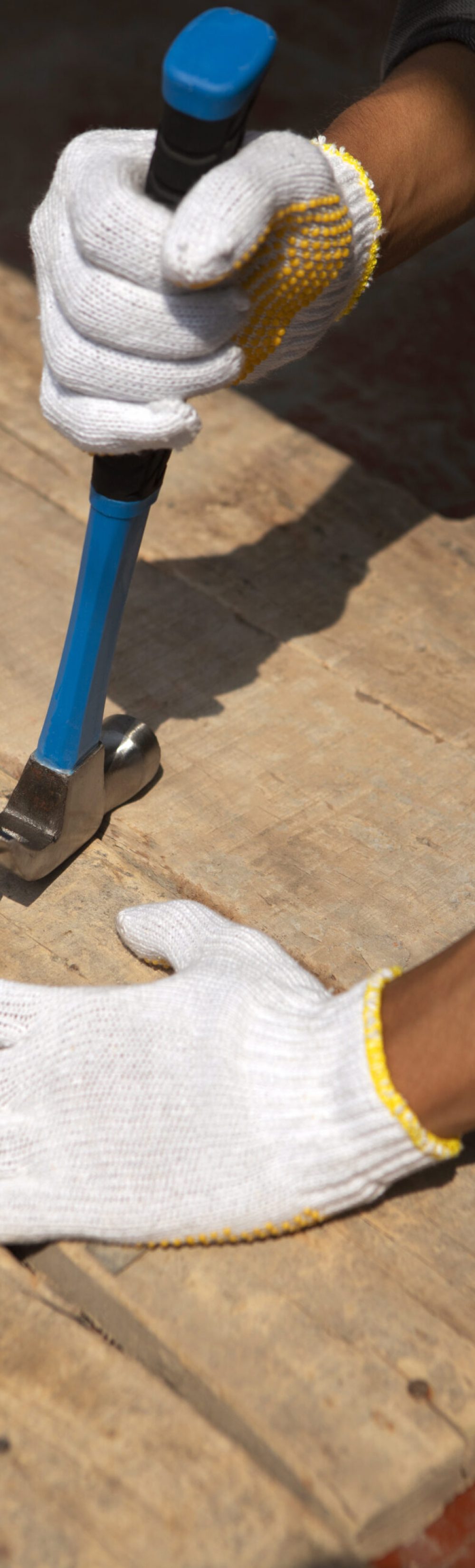 construction-worker-using-hammer-job-site